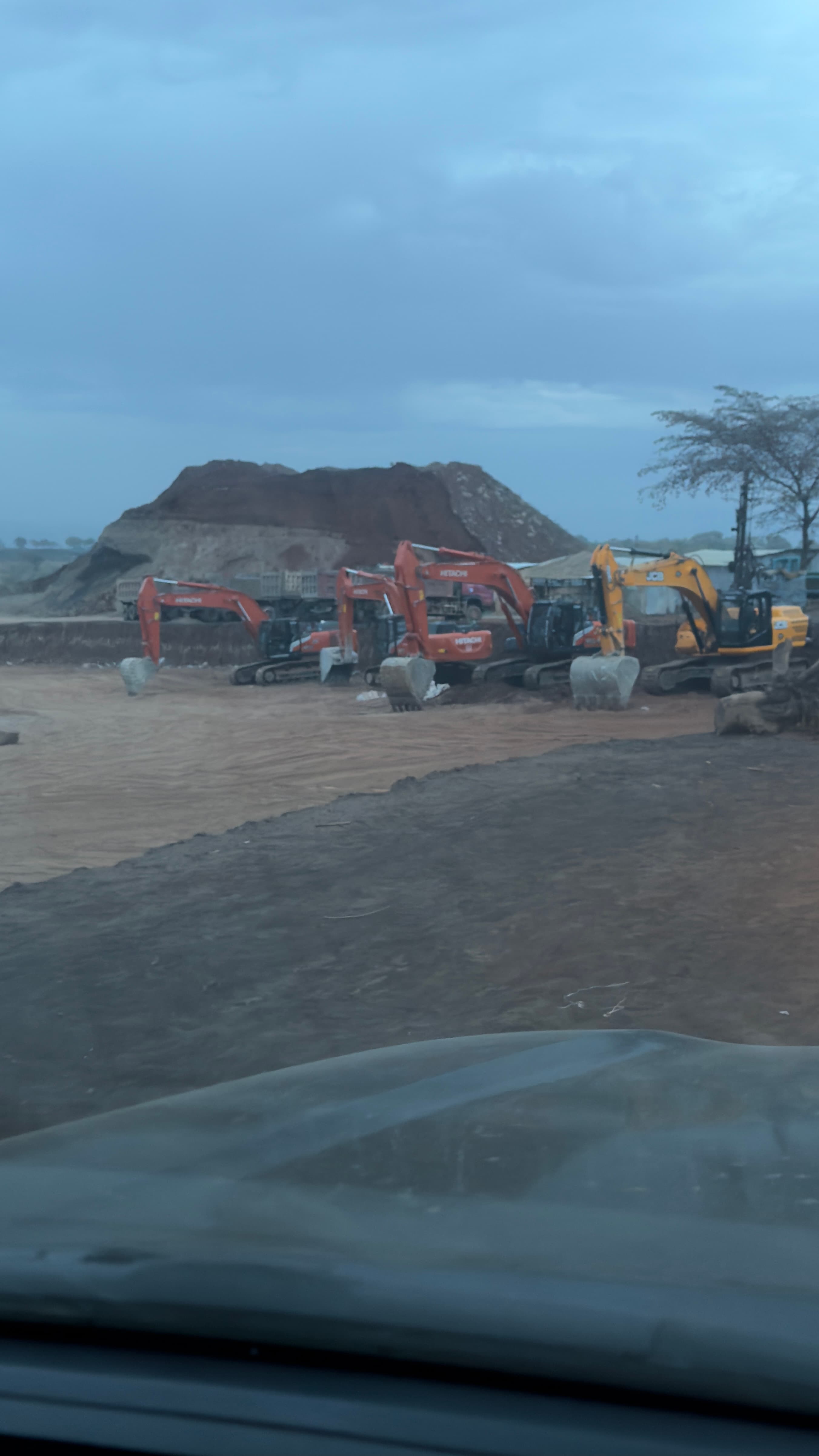 Fleet of heavy crawler excavators deployed on a large-scale mass earthmoving and infrastructure project site in Ethiopia
