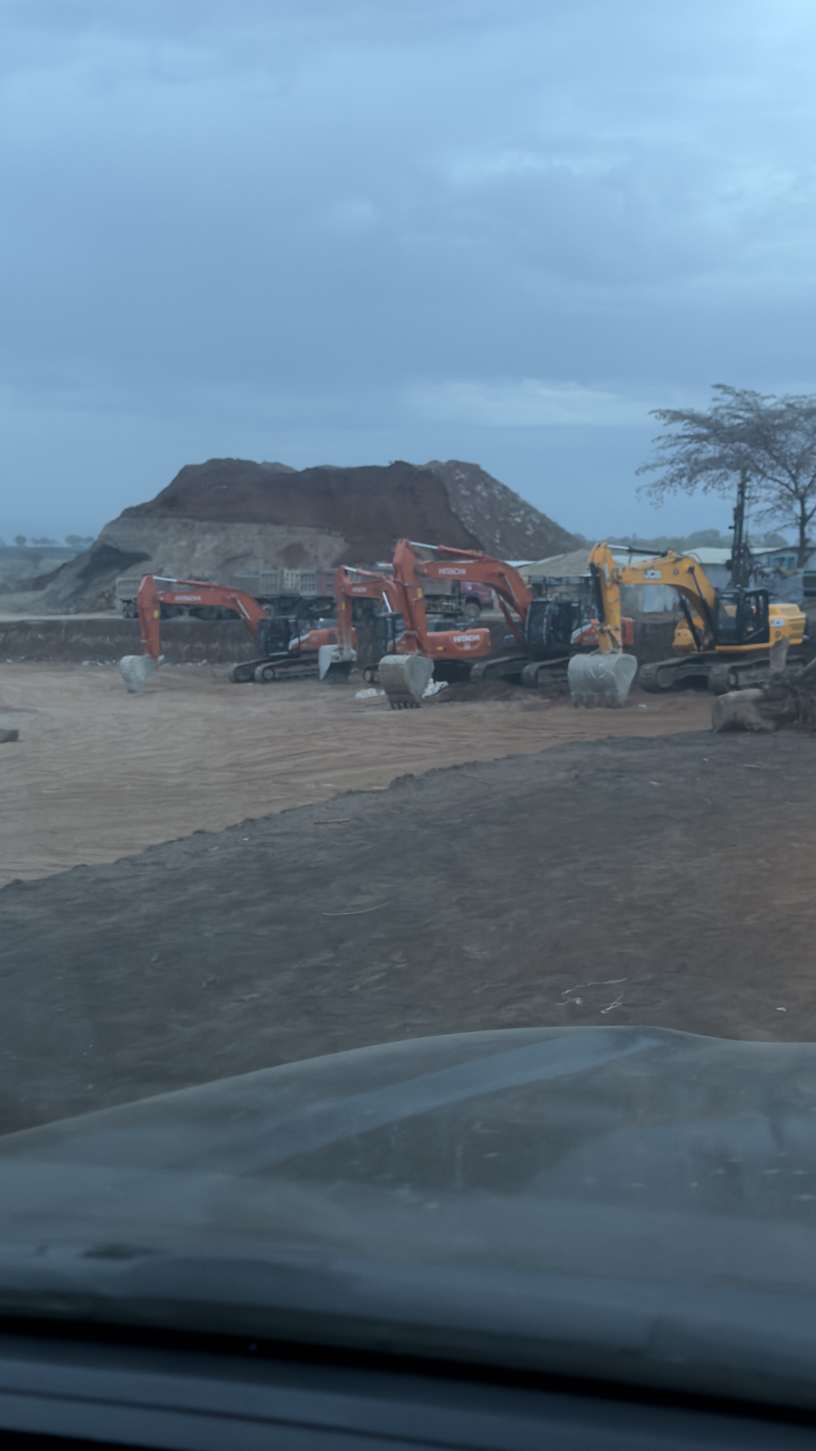 Fleet of heavy crawler excavators deployed on a large-scale mass earthmoving and infrastructure project site in Ethiopia